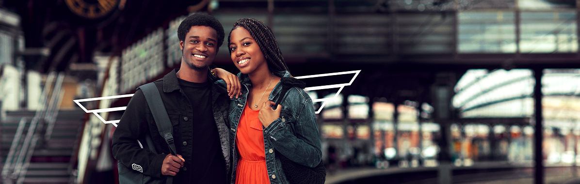 Young couple travelling by train