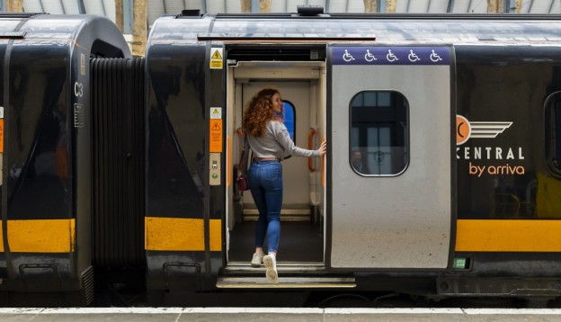lady walking onto a Grand Central train