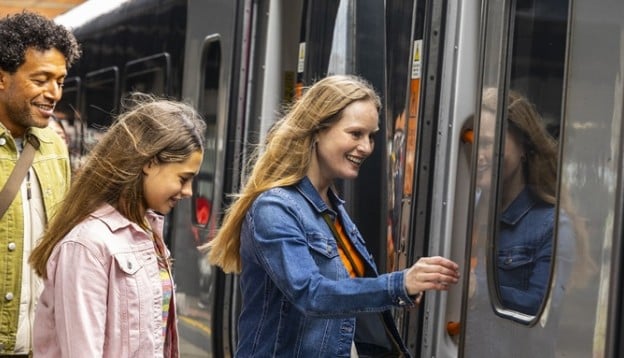 Family walking on a Grand Central train