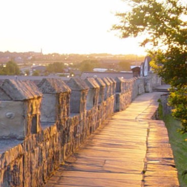 Sun setting on York city walls